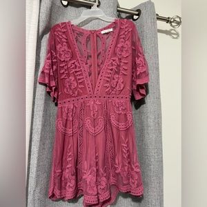 Pink size small romper from Honey Punch